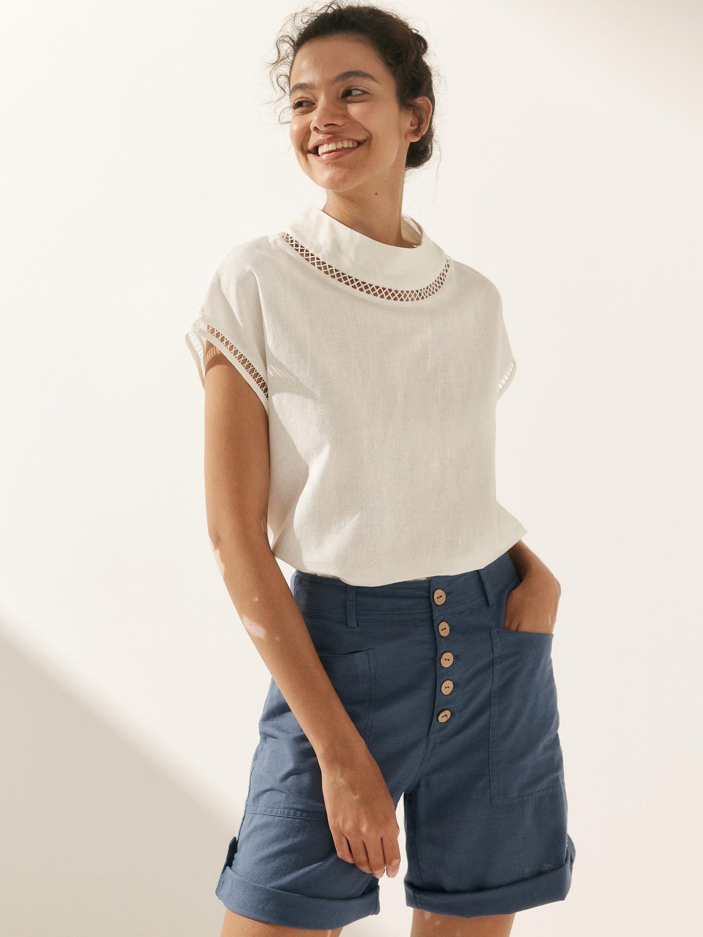 QUINN Cutout Turtleneck Top